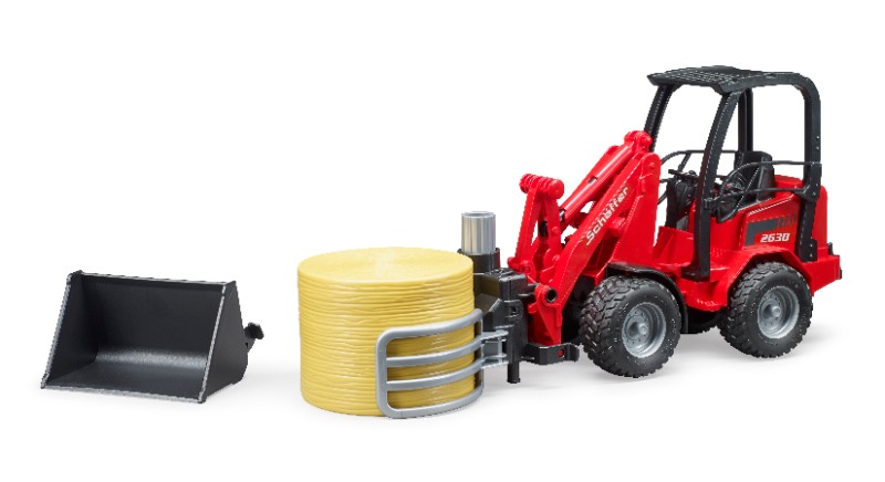 BRUDER Schäffer compact loader 2630 avec pince à balles + balle